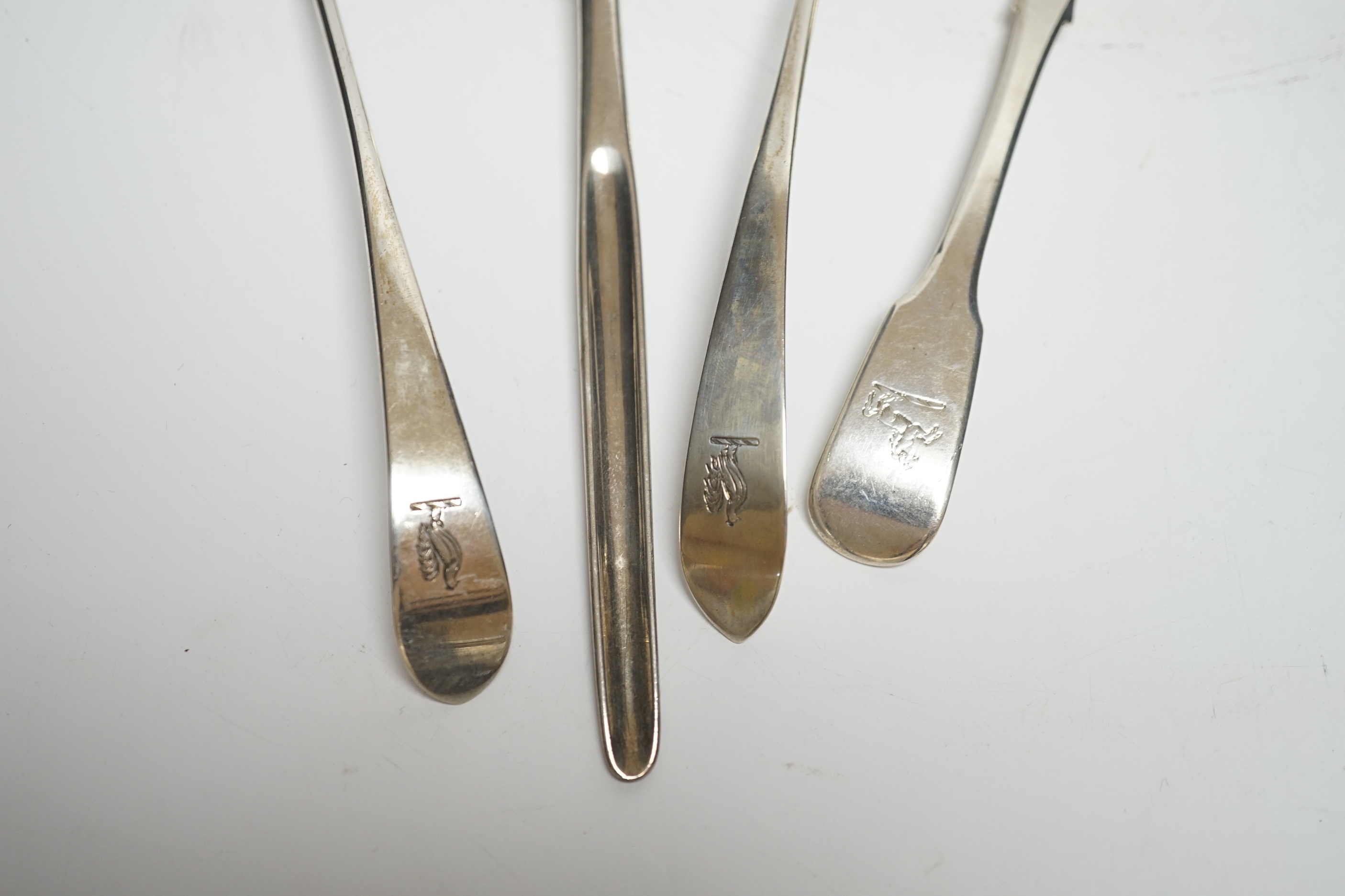 An 18th century silver spoon with marrow scoop handle, indistinct base marks, two silver sifter spoons and a white metal sauce ladle.